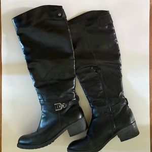 Tall black fashion boots  ; slight wear but great for function and fashion.